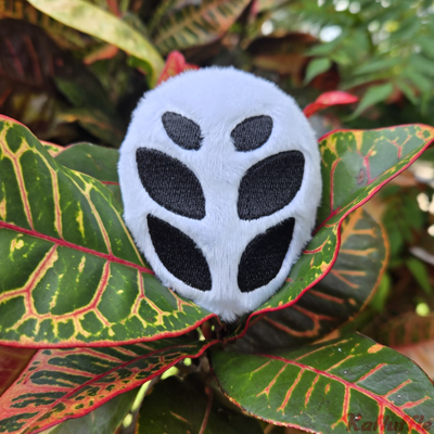 Plush keychain of Herrah's head from hollow knight