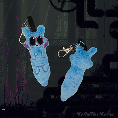 A plush keychain of the slugcat rivulet